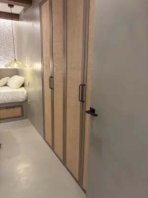 Cama o camas de una habitación en Precioso apartamento de playa con jardín privado