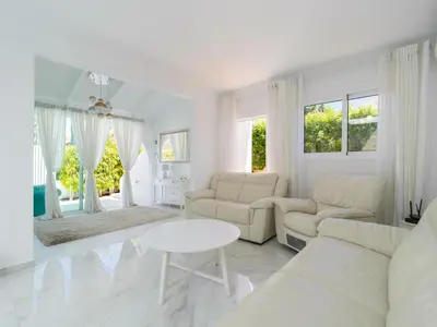 Zona de estar de FaroQuilla Suites Pasito Blanco