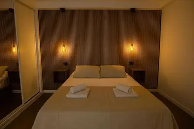 Cama o camas de una habitación en Apartamento con vistas al mar piso 16 y a 5 min de la playa de Las Canteras CASA CARMELA