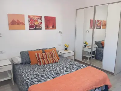 Cama o camas de una habitación en La Casita de Cheny