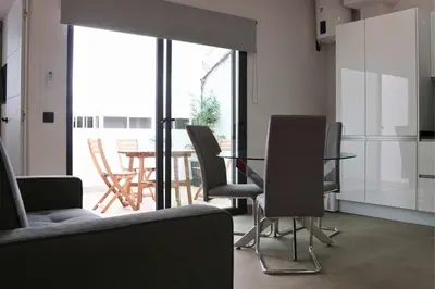 Una televisión o centro de entretenimiento en Fontanales Beach Flat