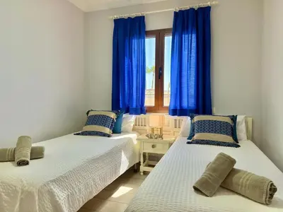 Cama o camas de una habitación en Los Balandros 111 by SunHousesCanarias
