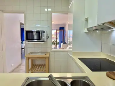 Una cocina o zona de cocina en Los Balandros 111 by SunHousesCanarias