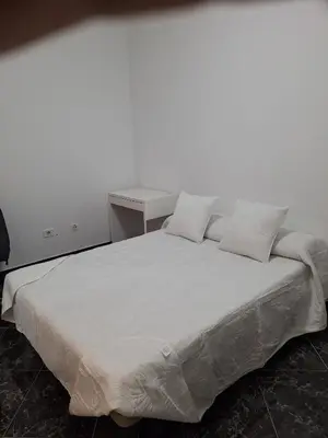 Cama o camas de una habitación en Casa bonita
