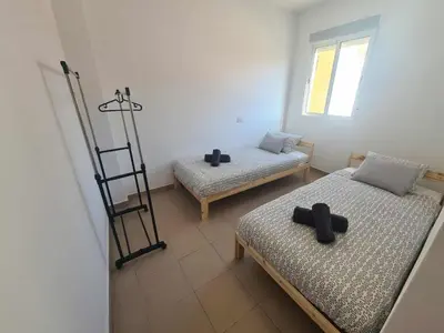 Cama o camas de una habitación en APARTMAN Ramón C 23