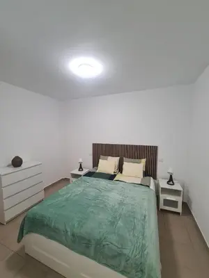 Cama o camas de una habitación en APARTMAN Ramón C 23