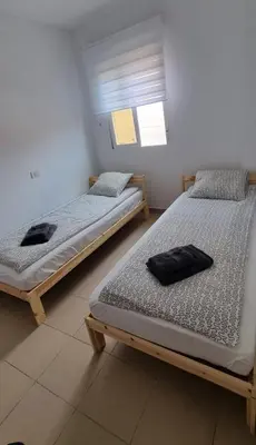Cama o camas de una habitación en APARTMAN Ramón C 23
