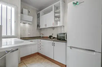 Una cocina o zona de cocina en Leo's House Las Canteras 1BR