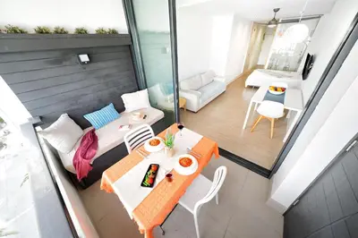 Zona de estar de Estudio con terraza vista mar II