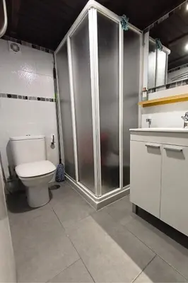 Un baño de Hierro Beach Flat
