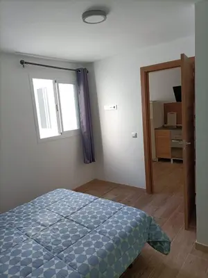 Cama o camas de una habitación en Apartment Taliarte 36