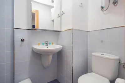 Un baño de GuestReady - Rosamar Apartments