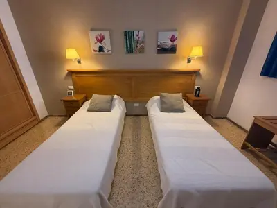 Cama o camas de una habitación en Stay in Gran Canaria, Agaete Parque 310