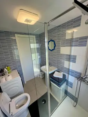 Un baño de Iguazu 2 bedroom apartment