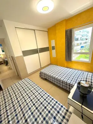 Cama o camas de una habitación en Iguazu 2 bedroom apartment