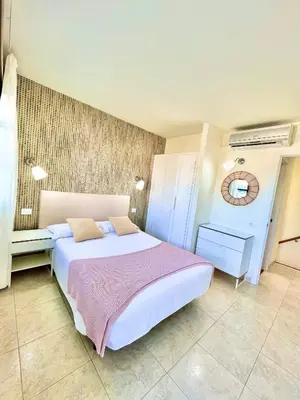 Cama o camas de una habitación en Paradise Dreams