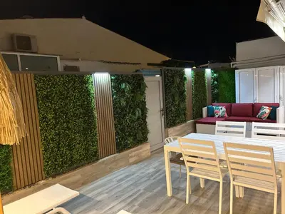 Un balcón o terraza de Oasis Beach Home II - Your Private Retreat with Jacuzzi