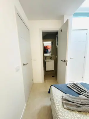 Una televisión o centro de entretenimiento en Bungalow Diana