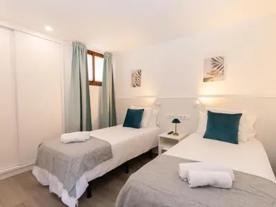 Cama o camas de una habitación en Secrets of Atlantic Holiday Home