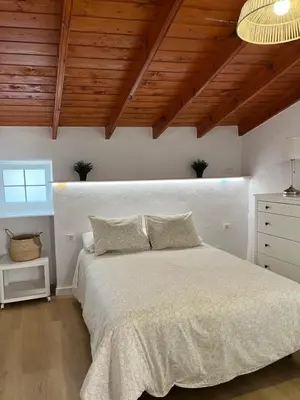 Cama o camas de una habitación en Moya senderos, naturaleza y mar 2