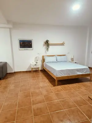 Cama o camas de una habitación en La Timba Apartamento