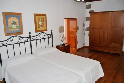 Cama o camas de una habitación en Casa Rural Los Suárez