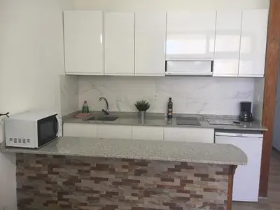 Una cocina o zona de cocina en Las Dunas - Playa del Ingles