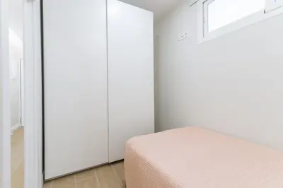 Cama o camas de una habitación en M&M SUITE AGAETE PARQUE by HOMESTAYGRANCANARIA