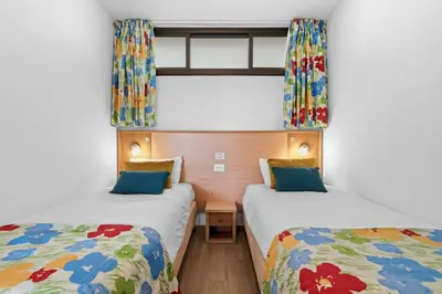 Cama o camas de una habitación en SUNSET BAY 208 by HOMESTAYGRANCANARIA