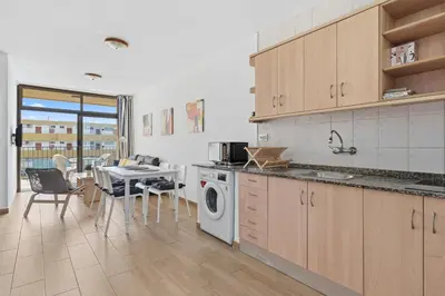 Una cocina o zona de cocina en SUNSET BAY 208 by HOMESTAYGRANCANARIA
