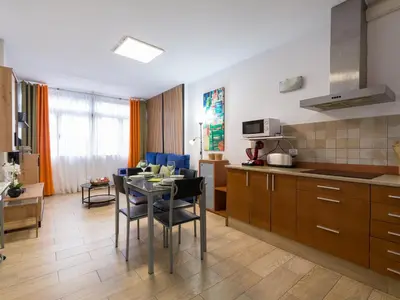 Una cocina o zona de cocina en City Family Sargento Llagas