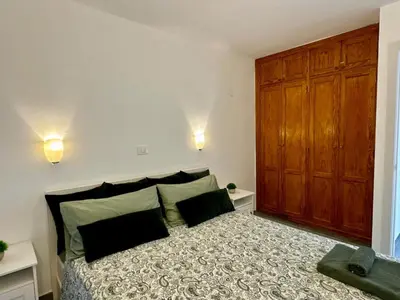 Cama o camas de una habitación en playa del cura apartment with terrace