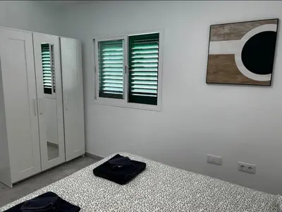 Cama o camas de una habitación en Beach life only 5 minutes away and Heated pool