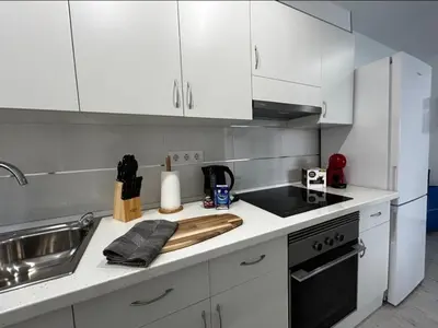 Una cocina o zona de cocina en Beach life only 5 minutes away and Heated pool