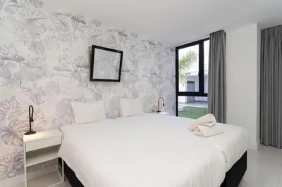 Cama o camas de una habitación en Villa Art & Design Tauro pool Wi-Fi BBQ