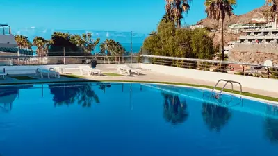 Piscina en o cerca de Fresh Flat with Terrace in Puerto Rico