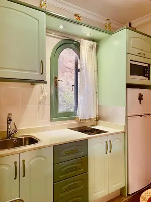 Una cocina o zona de cocina en Fresh Flat with Terrace in Puerto Rico