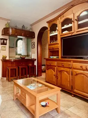 Una televisión o centro de entretenimiento en Fresh Flat with Terrace in Puerto Rico