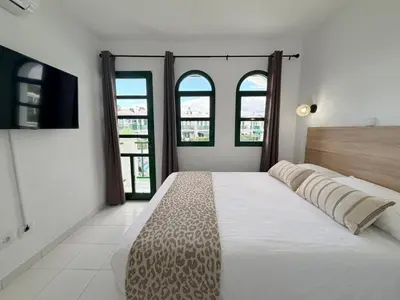 Cama o camas de una habitación en Oasis Maspalomas Dunaflor Verde