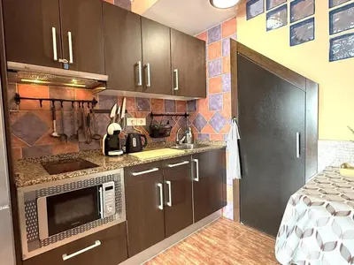 Una cocina o zona de cocina en DunaFlor Verde Sunny Bungalow