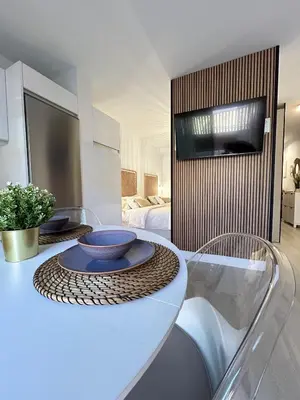 Una televisión o centro de entretenimiento en Apartamento acogedor Junto al Mar en Arguineguin