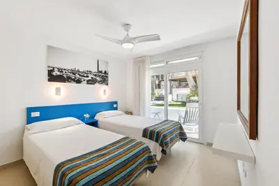 Cama o camas de una habitación en MASPALOMAS Foresta 6