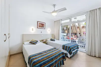 Cama o camas de una habitación en MASPALOMAS Foresta 12