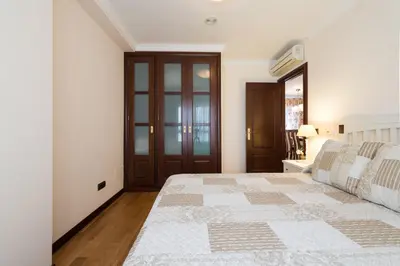 Cama o camas de una habitación en Apartamento Good Holidays
