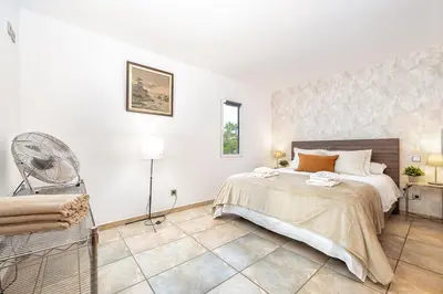 Cama o camas de una habitación en Oasis en San Agustín