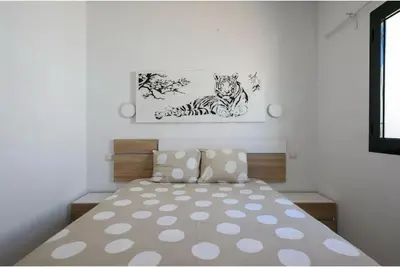 Cama o camas de una habitación en Maspalomas Lago 36
