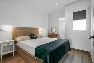 Cama o camas de una habitación en Taliarte Clavellinas