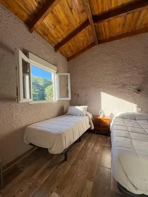 Cama o camas de una habitación en El Refugio de Juncalillo