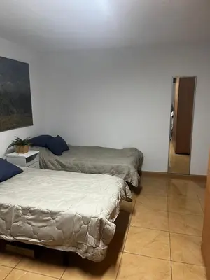Cama o camas de una habitación en Oasis de paz junto al mar