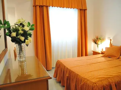 Cama o camas de una habitación en Apartment Geräumige Wohnung by Interhome